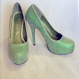 Sparkly green fishnet lining heels